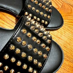 Black studded slides